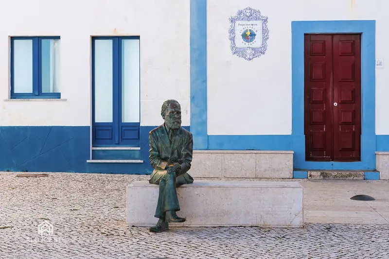 Traditional Portuguese façade with tiles and painted doors