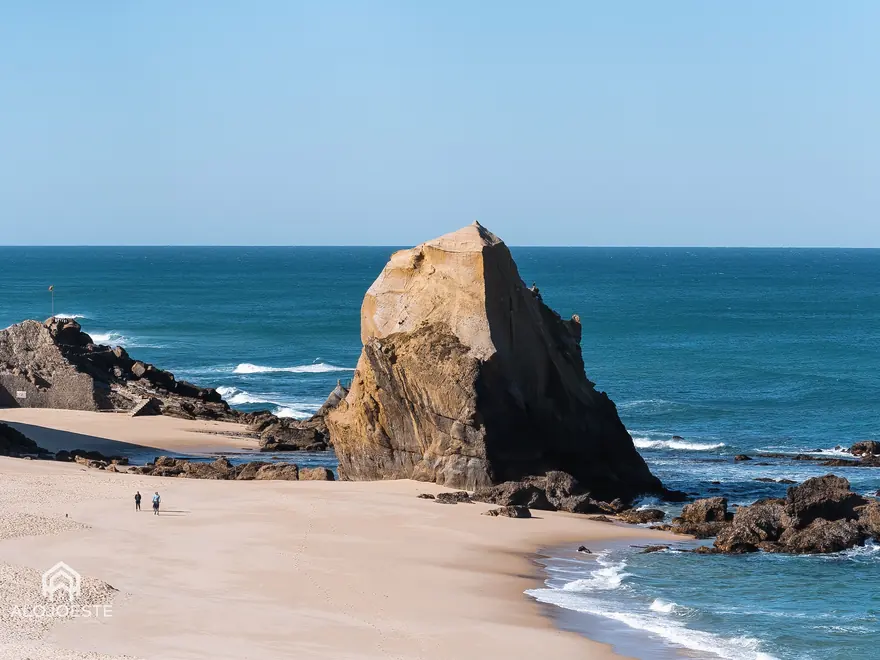 Beach on the Oeste coast with the offshore rock, late in the afternoon.